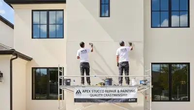 Professional stucco repair on Fort Worth TX home exterior by expert local house painters